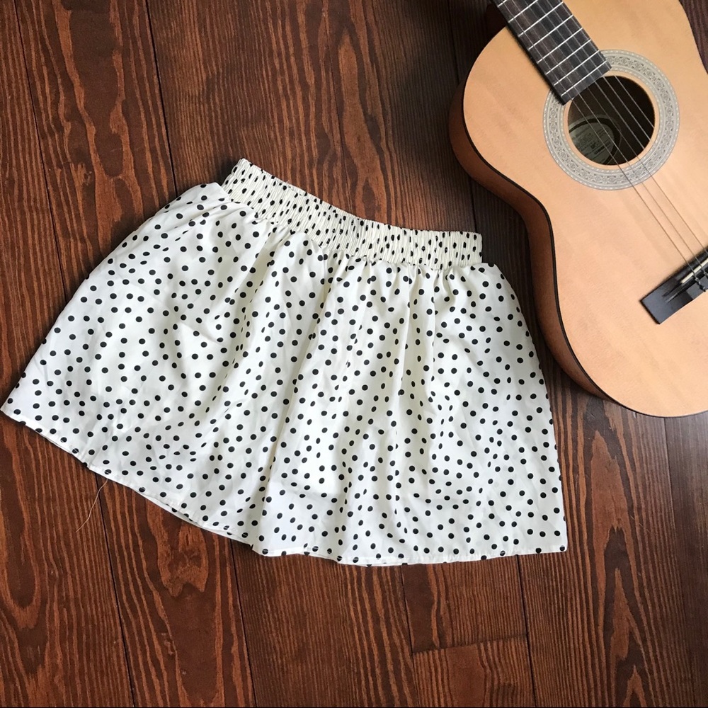 Cream mini skirt with black polkadots